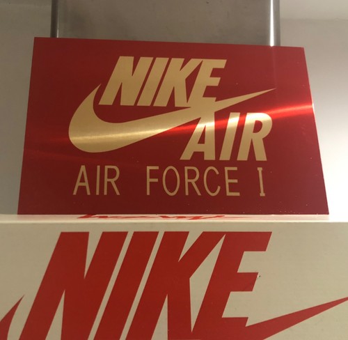 Insegna nike oro specchiato - insegna,